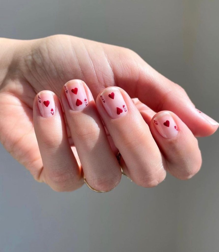 Gorgeous Acrylic Nail Ideas for Valentine’s Day 2025 dainly heart patterns nails